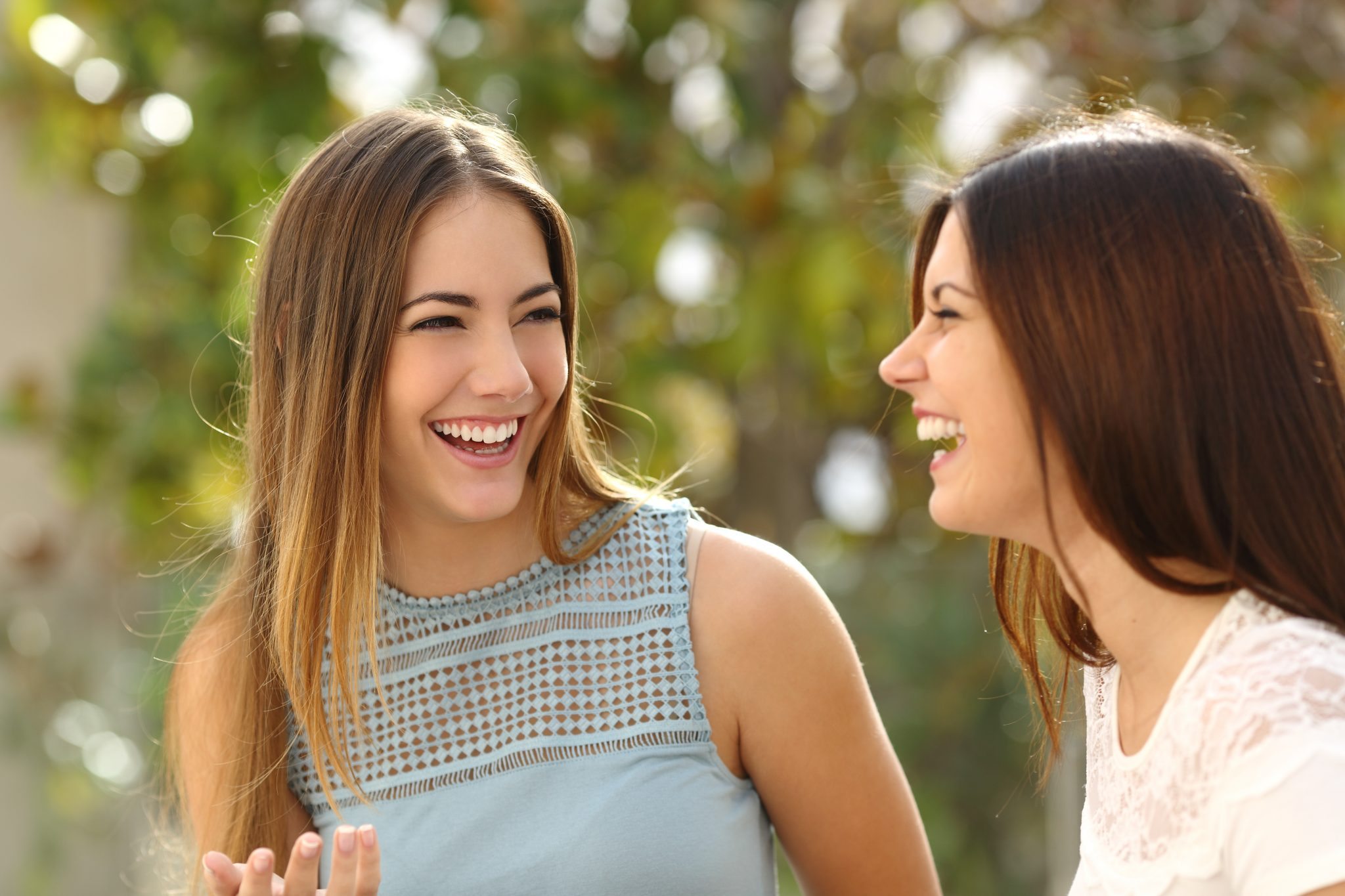 bigstock-Happy-Women-Talking-And-Laughi-87121232